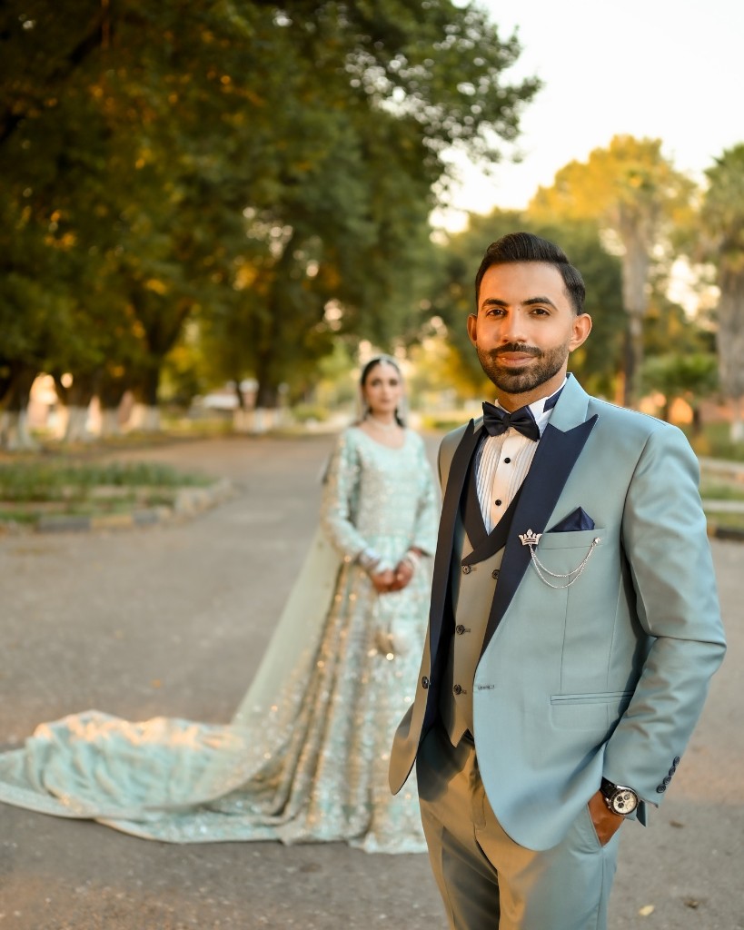 Groom in blue suit