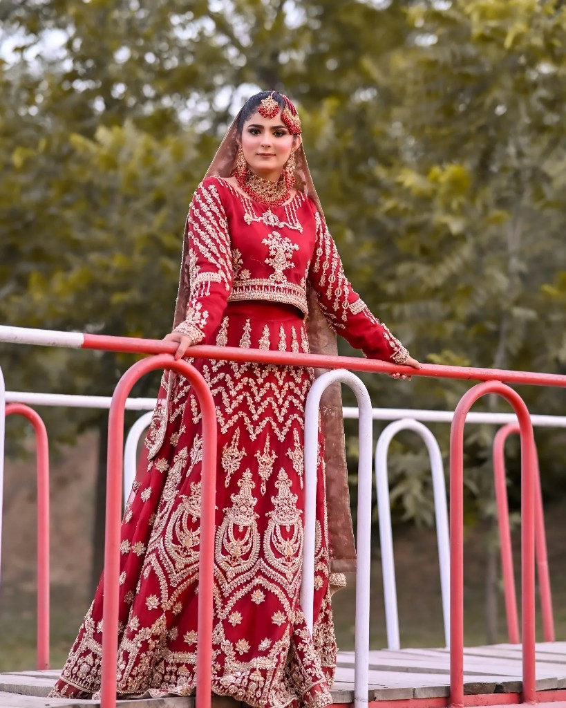 Red lehenga on bridge
