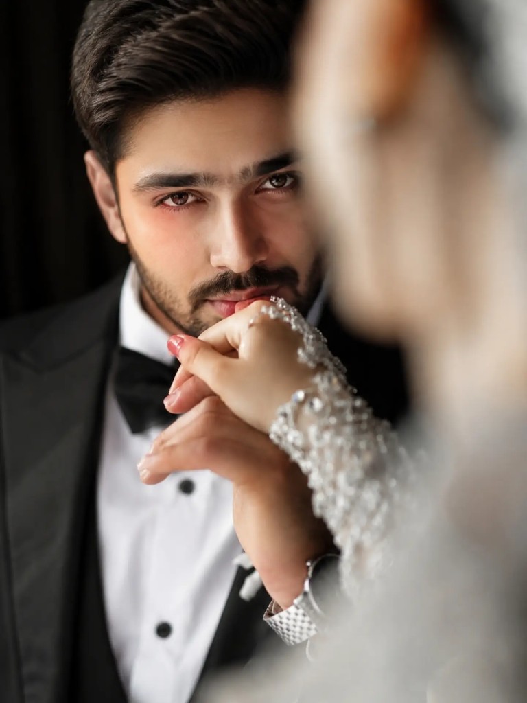 Groom hand kiss